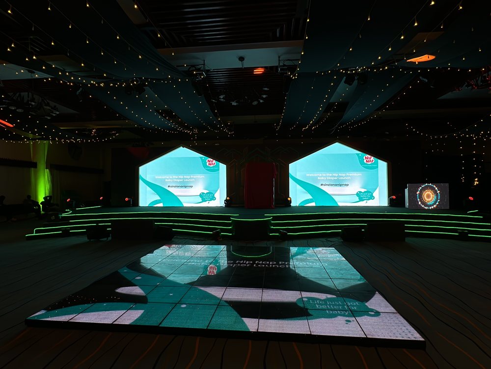A darkened ballroom moments before guests arrive, built by Red Giant for Nip Nap