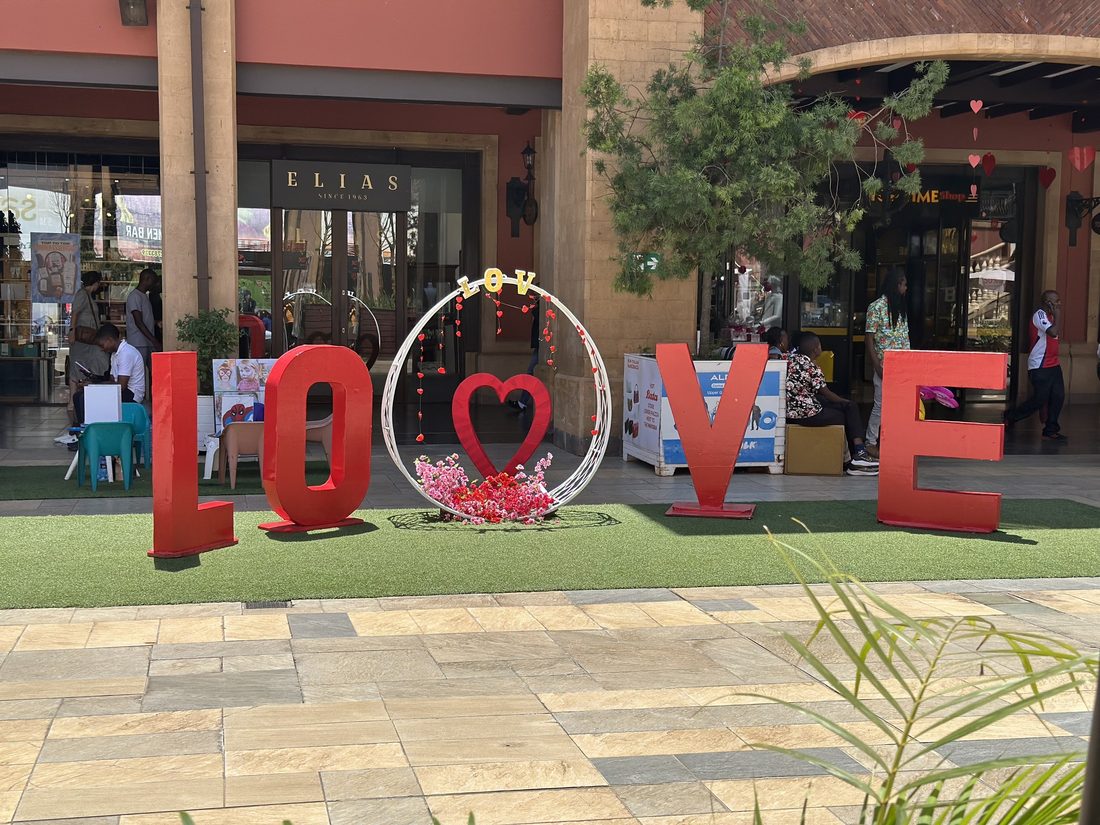 Large LOVE letters installed in a shopping centre courtyard