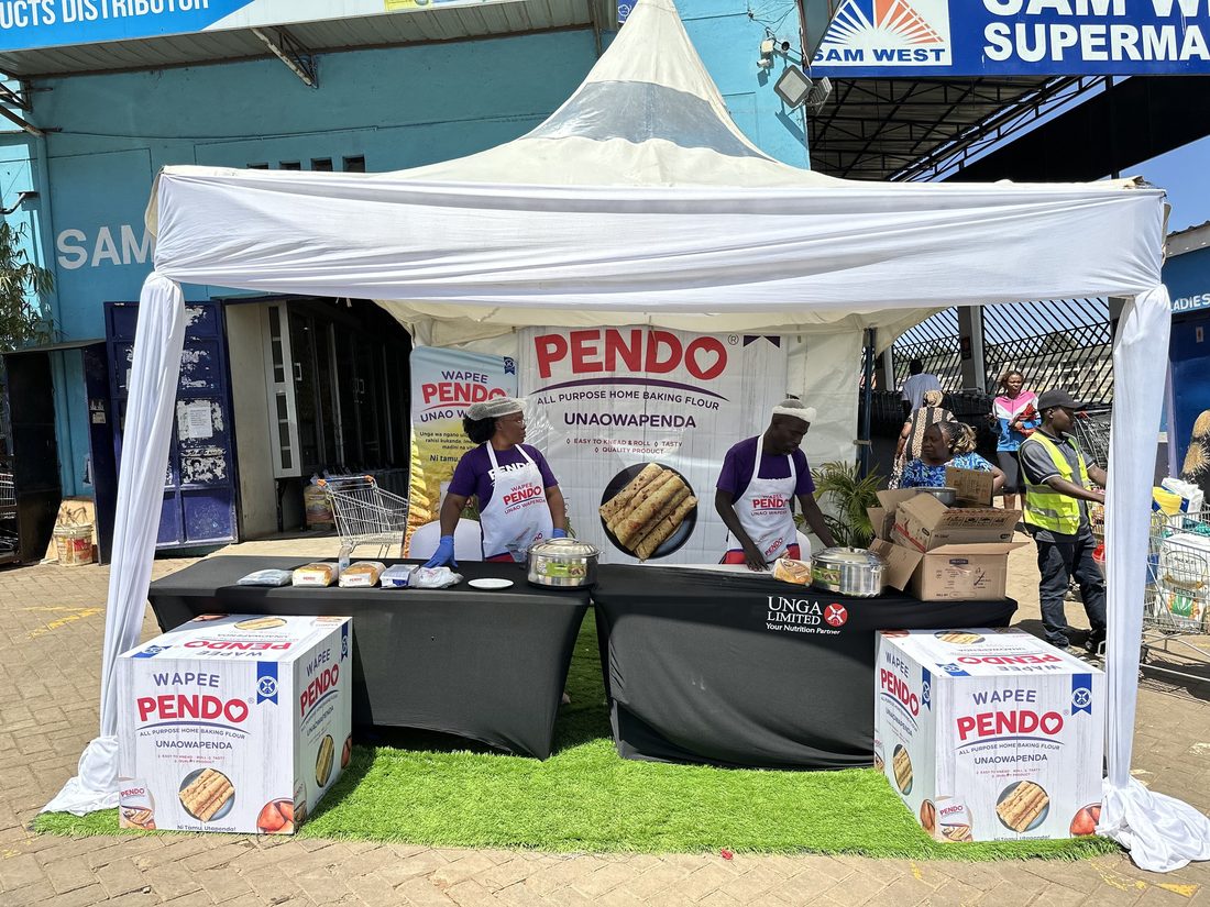 A Pendo gazebo set up outside a supermarket