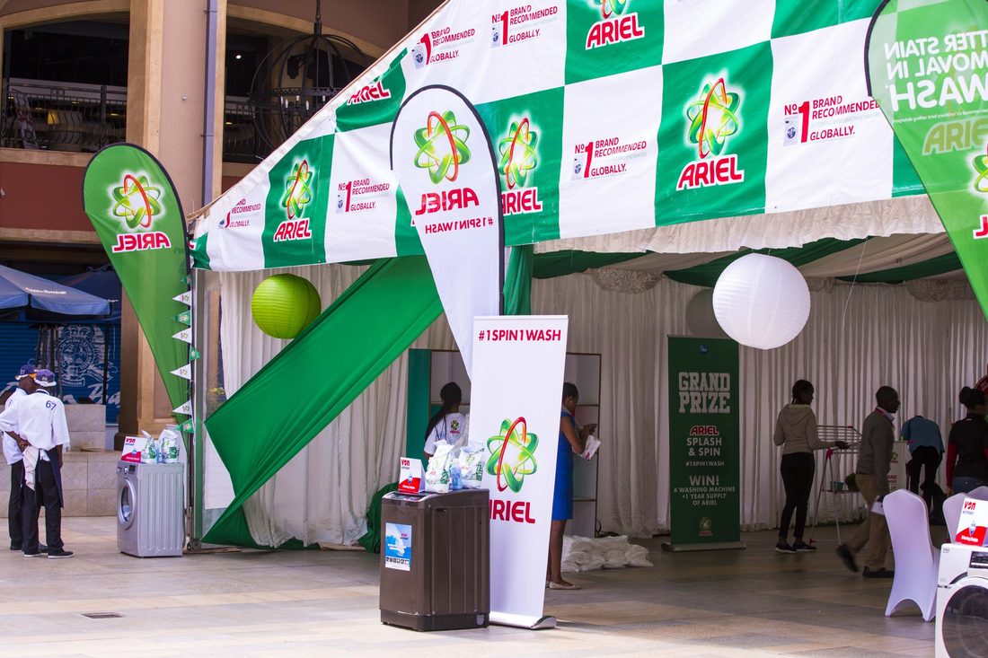 A grand prize display stand dressed in Ariel branding at the entrance to a marquee
