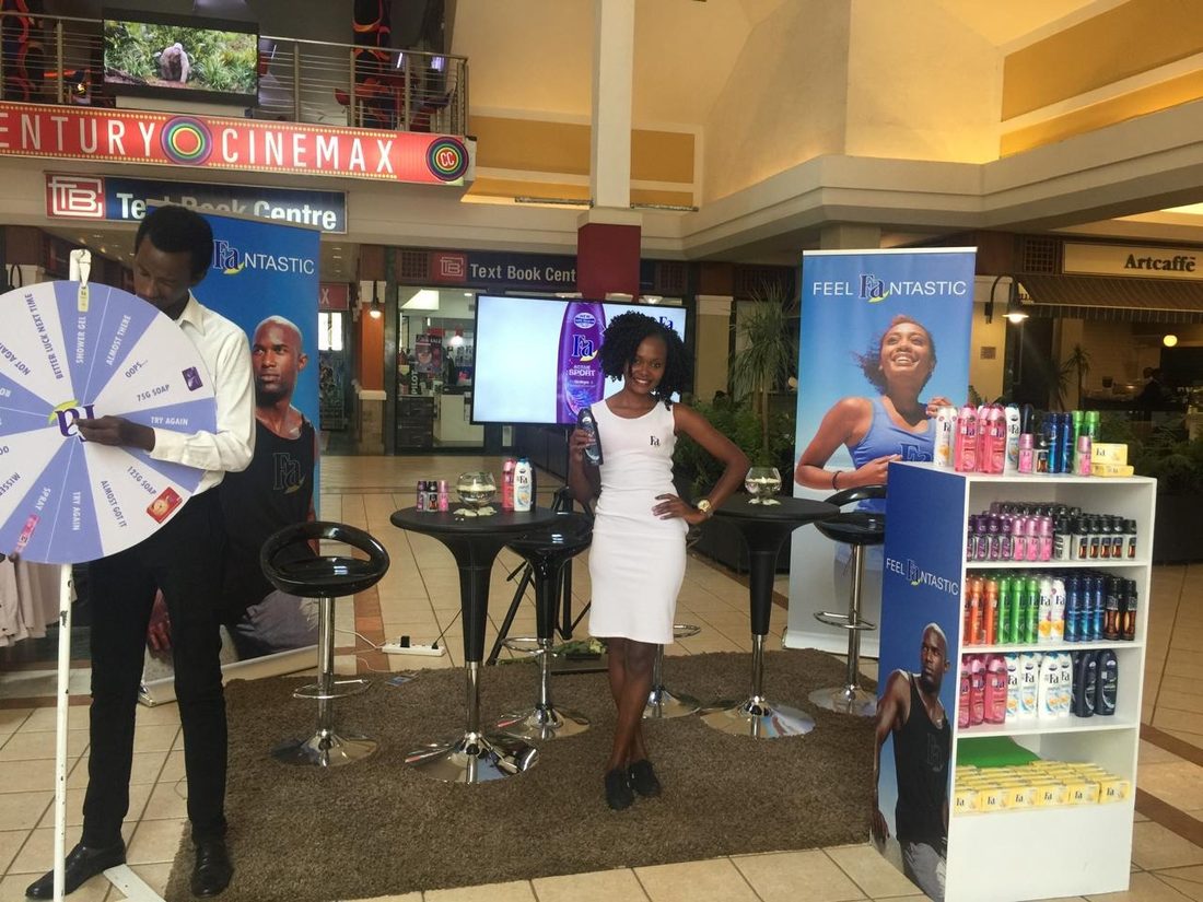 A spin-wheel stand outside a cinema entrance