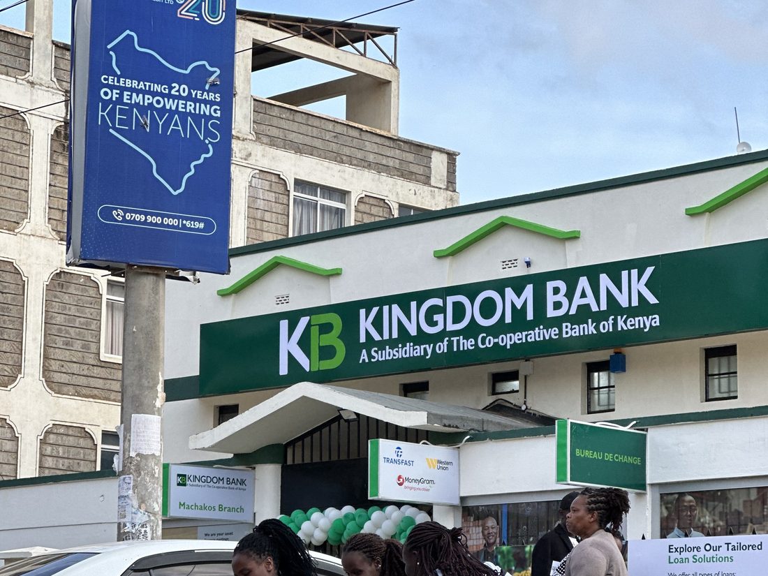 A Kingdom Bank branch frontage with the activation team working the street outside