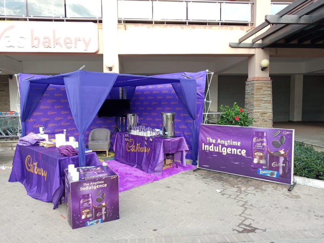 A sampling gazebo set up outside a supermarket bakery