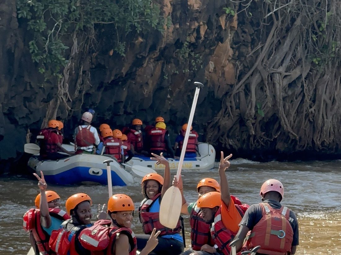 A raft crew paddling through a rocky gorge
