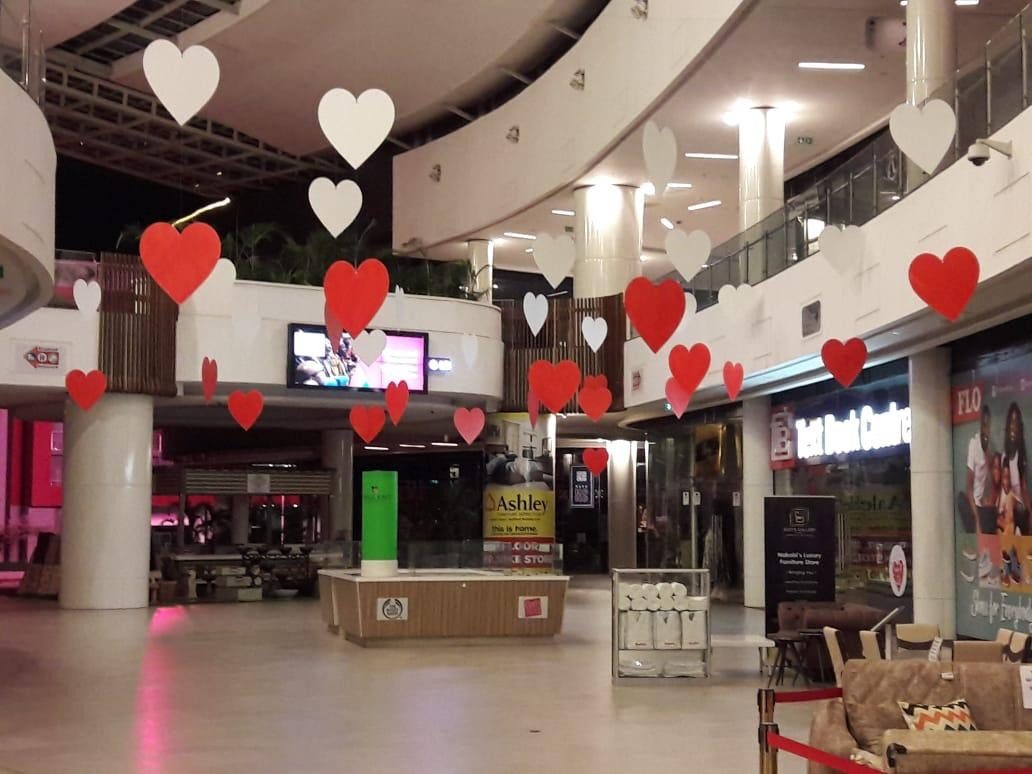 Hanging heart dressing above a shopping centre atrium